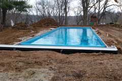 Backfill with dense grade and fill the pool with water photo 1