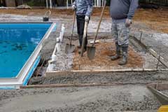 Pour concrete patio and construct any features photo 3