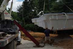 Deliver and position the fiberglass pool