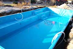 Deliver and position the fiberglass pool